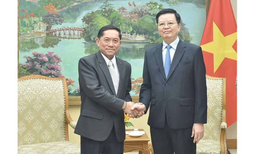 Phó Thủ tướng Mai Văn Chính tiếp Tổng Giám đốc Thông tấn xã Pathet Lào