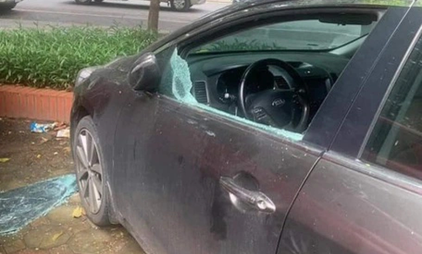 Đậu xe trước chung cư, 9 ô tô bị đập vỡ kính ở Hà Nội
