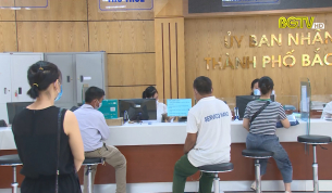 Giải quyết thủ tục hành chính gắn với phòng chống dịch Covid-19
